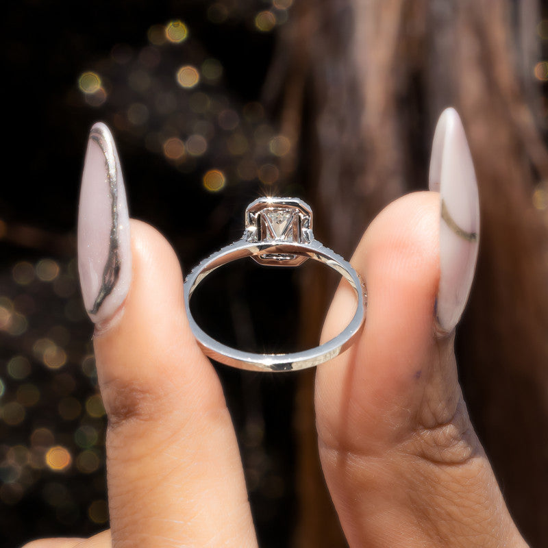 Emerald Cut Diamond Halo Engagement Ring with Pavé Band