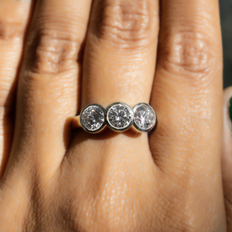 Three-Stone Round Brilliant Diamond Bezel-Set Ring
