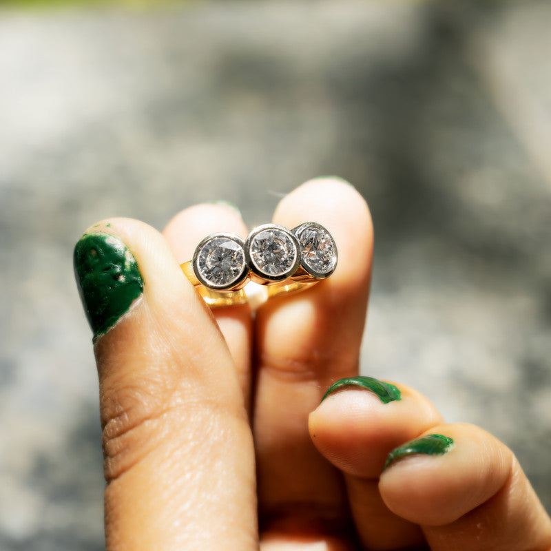 Three-Stone Round Brilliant Diamond Bezel-Set Ring