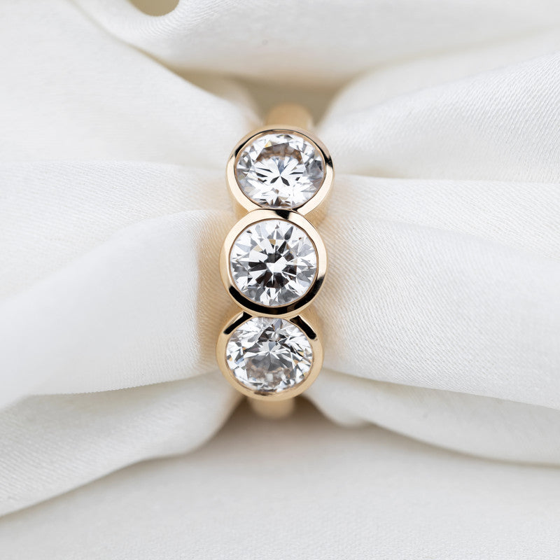 Three-Stone Round Brilliant Diamond Bezel-Set Ring