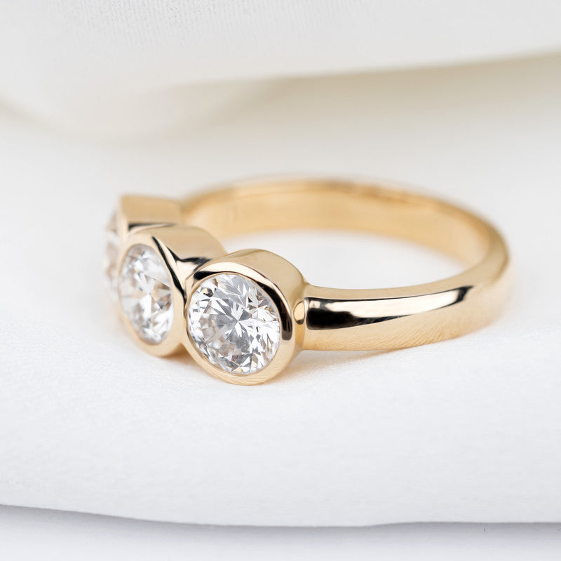 Three-Stone Round Brilliant Diamond Bezel-Set Ring