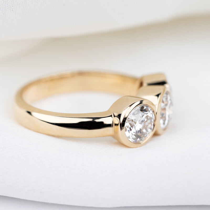 Three-Stone Round Brilliant Diamond Bezel-Set Ring
