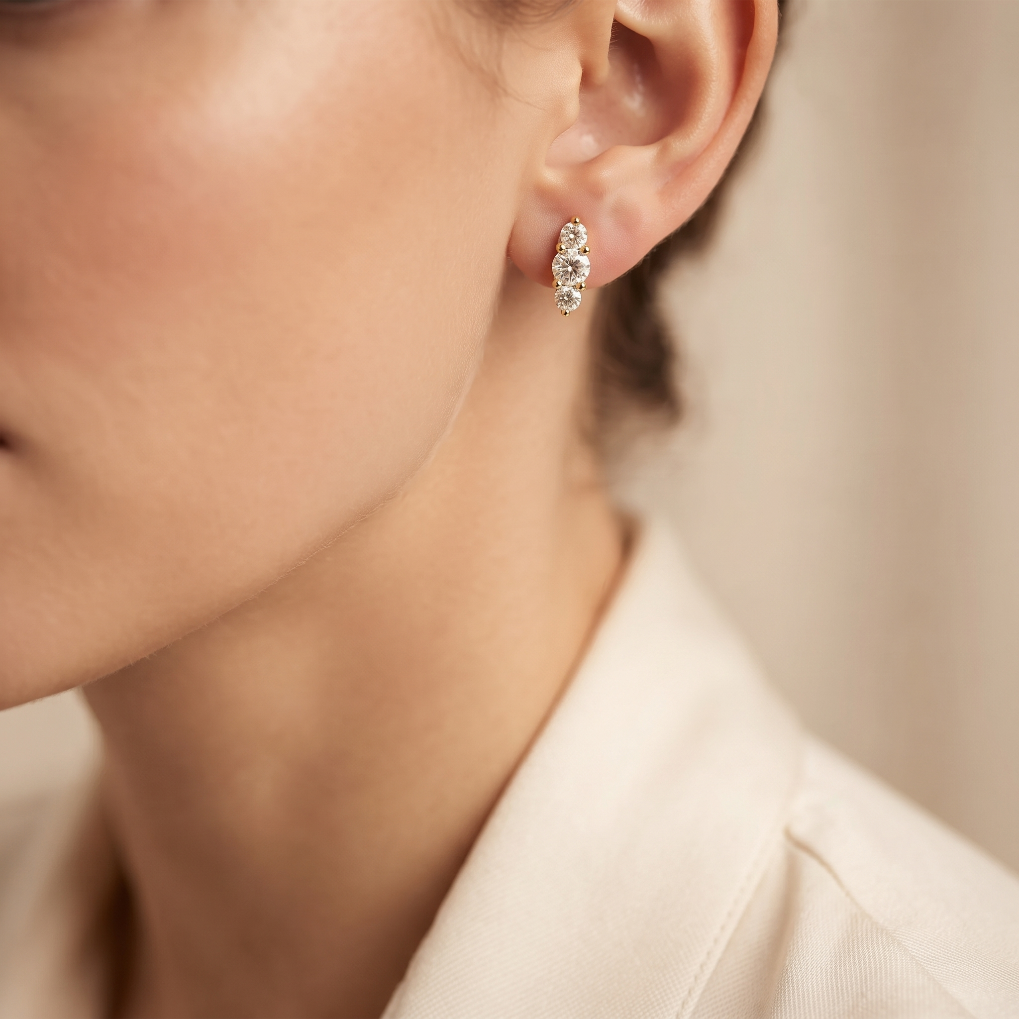 Graduated Three Stone Diamond Stud Earrings