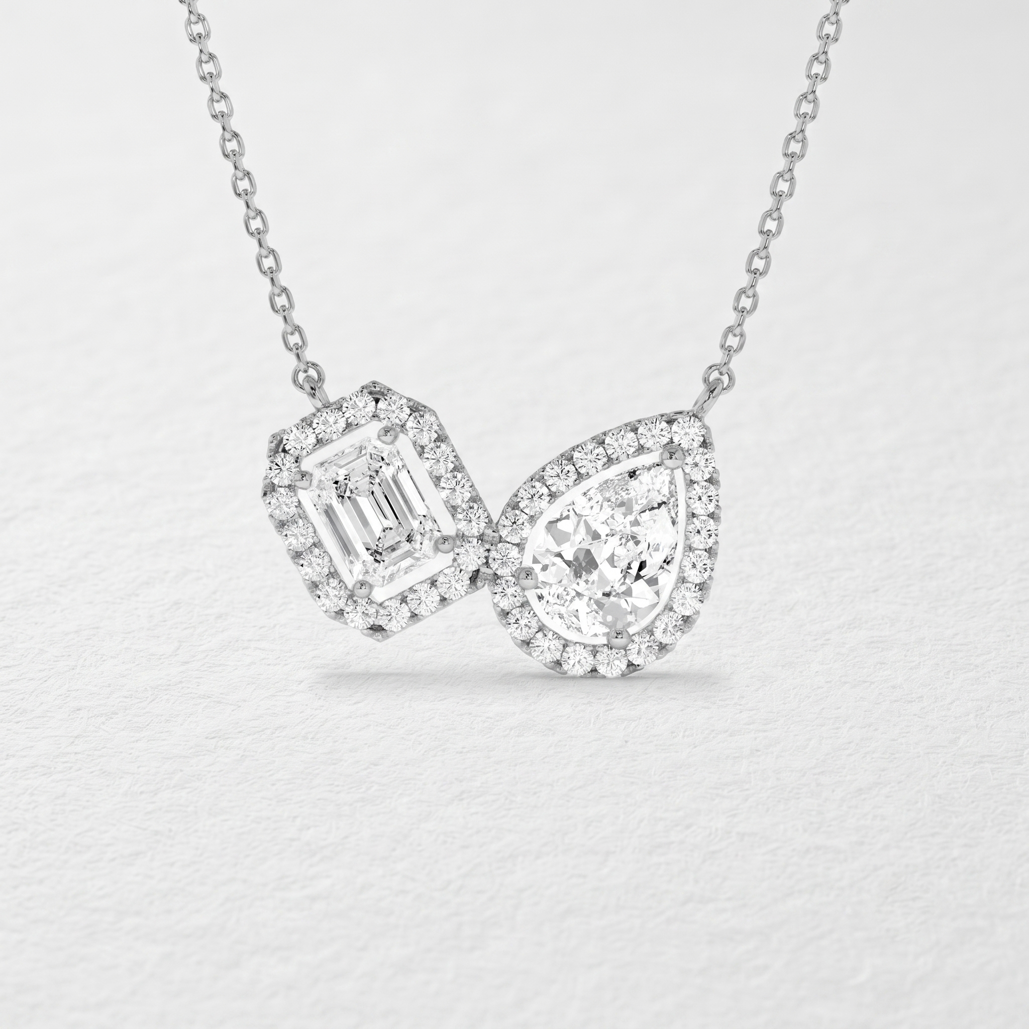 Emerald Pear Double Halo Diamond Pendant
