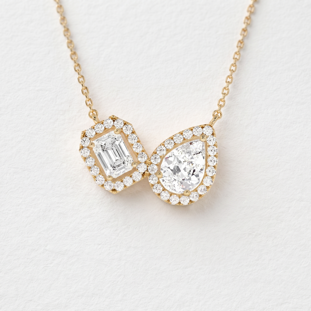 Emerald Pear Double Halo Diamond Pendant