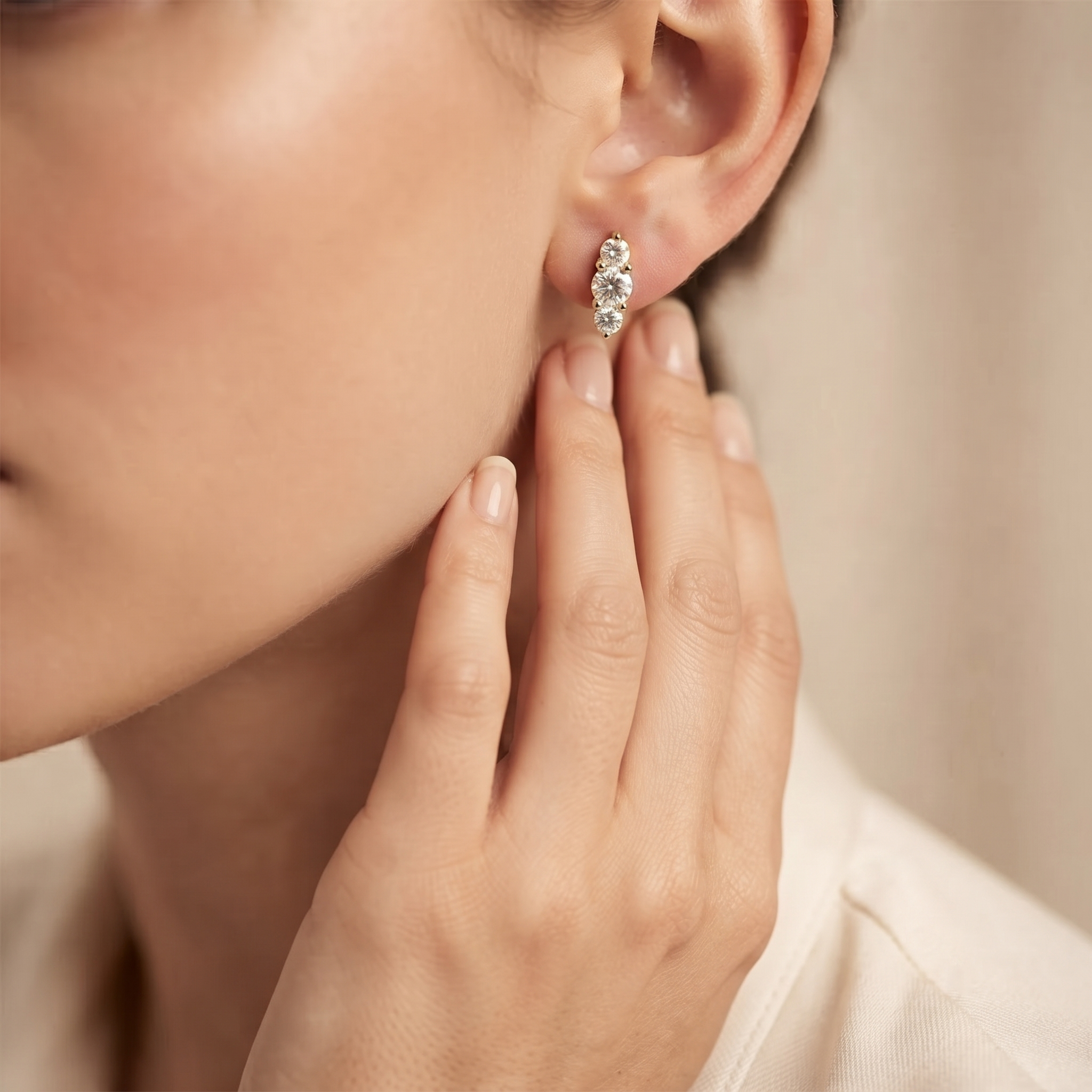 Graduated Three Stone Diamond Stud Earrings