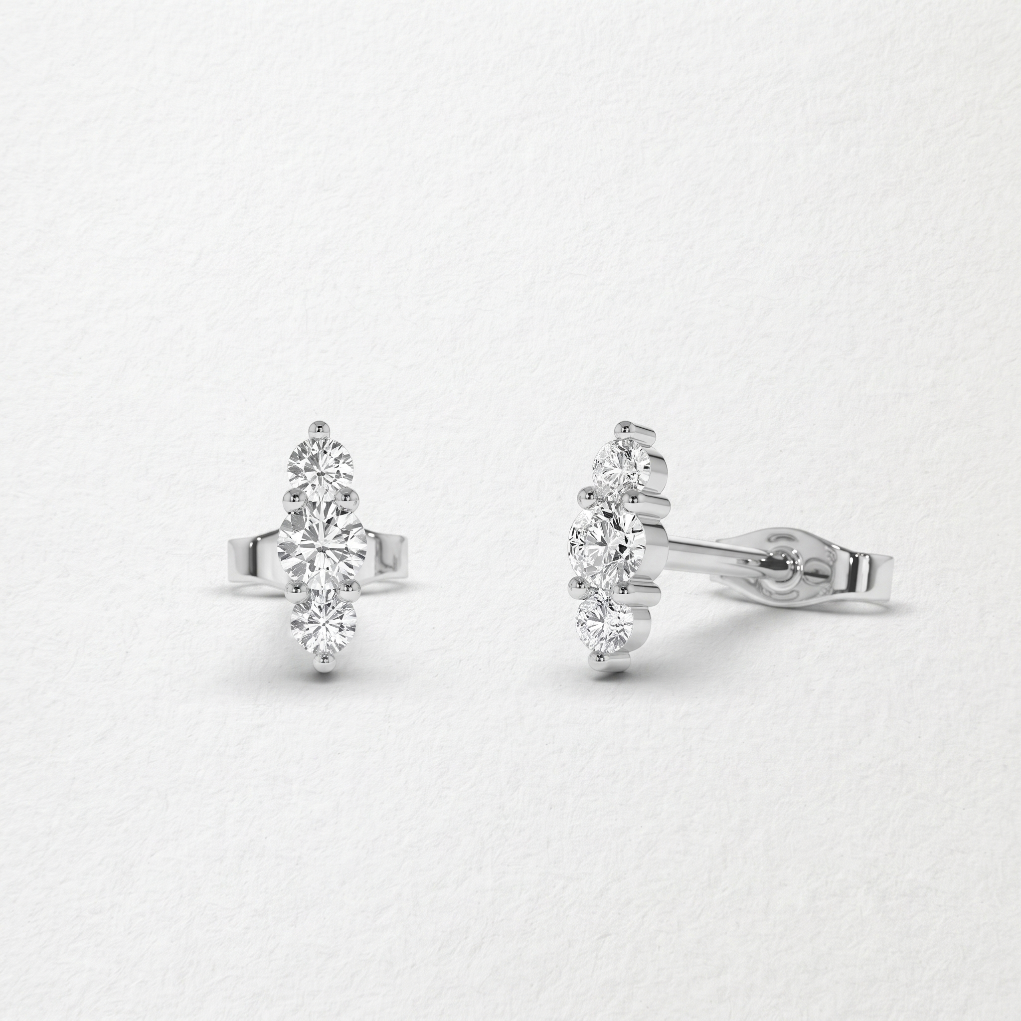 Graduated Three Stone Diamond Stud Earrings