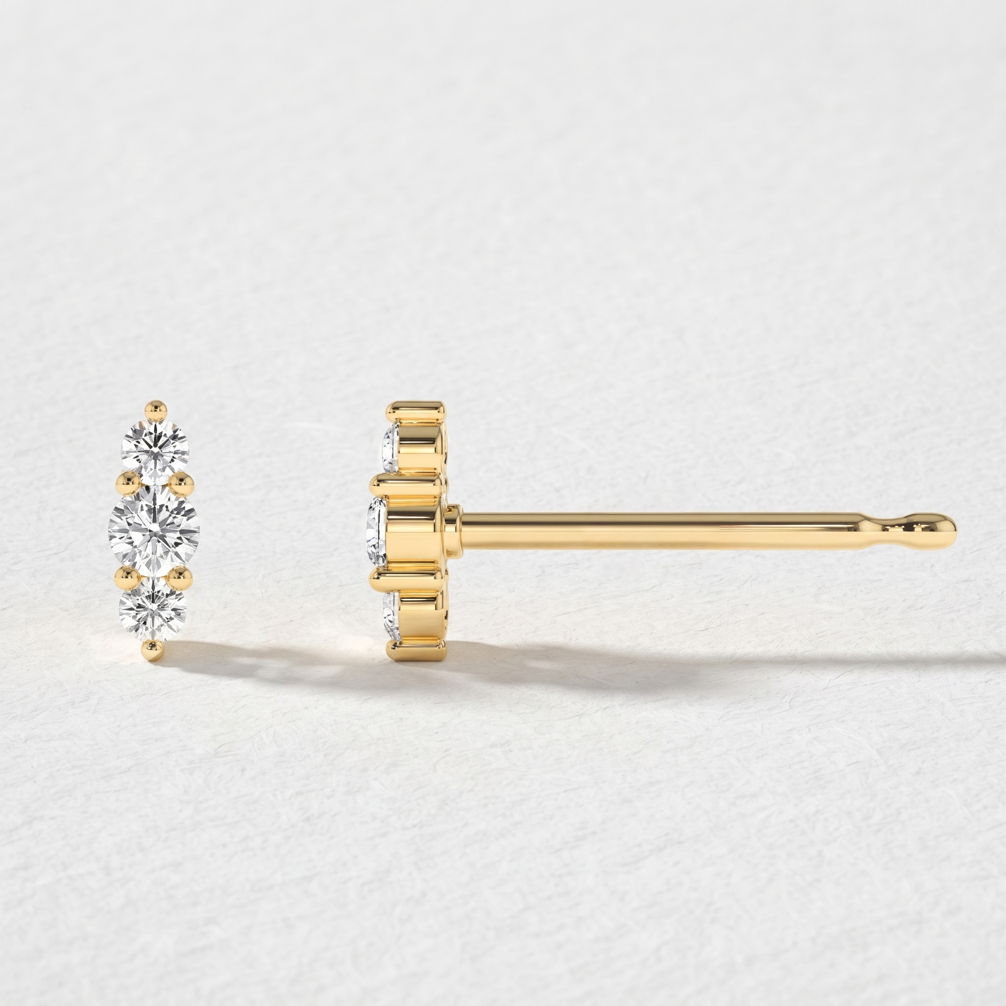 Graduated Three Stone Diamond Stud Earrings