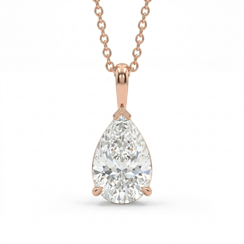 Rose gold necklace with a pear-shaped diamond pendant on a white background